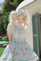 This Sweet Lolita blue and pink sleeveless strap dress features delicate lace, printed details, and charming bow accents, creating a sweet and elegant Lolita style. The backless design adds a playful touch while maintaining a graceful silhouette. Product Details: The product includes one strap dress, perfect for achieving a cute and refined Lolita look.