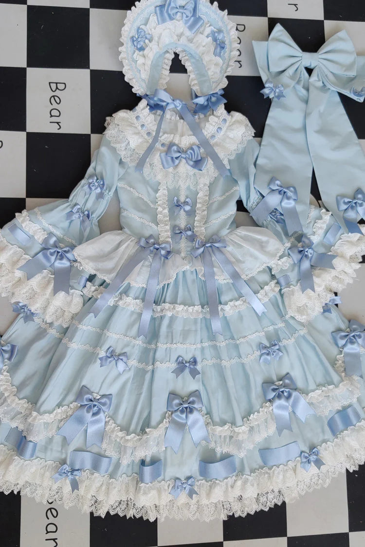 Design Concept:

This Sweet Lolita dress in soft blue features a round neck and long flared sleeves, adorned with delicate lace and a charming ribbon for a bridal-inspired princess look. The silhouette combines elegance with daily wearability, creating a sweet and graceful Lolita aesthetic. Perfect for special occasions, cosplay, or completing a feminine wardrobe, this dress highlights both sophistication and playful charm.