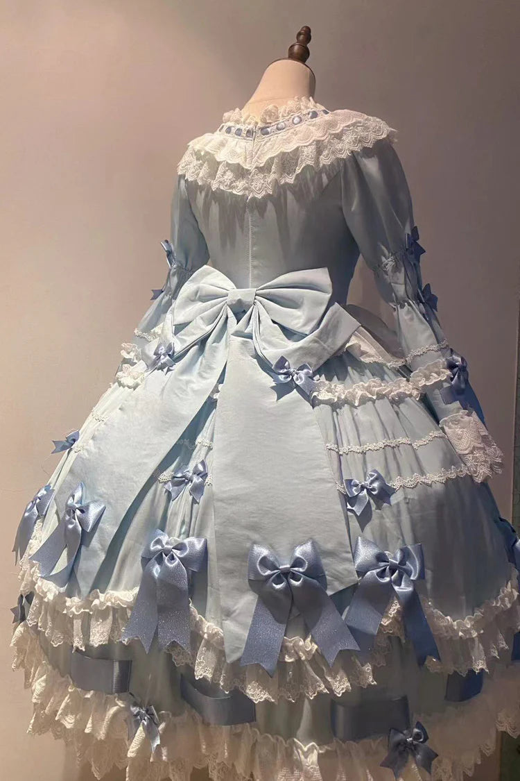 Design Concept:

This Sweet Lolita dress in soft blue features a round neck and long flared sleeves, adorned with delicate lace and a charming ribbon for a bridal-inspired princess look. The silhouette combines elegance with daily wearability, creating a sweet and graceful Lolita aesthetic. Perfect for special occasions, cosplay, or completing a feminine wardrobe, this dress highlights both sophistication and playful charm.