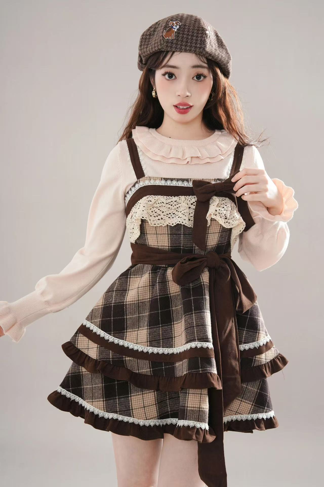 Design Concept:

This Sweet Lolita brown and apricot plaid JSK dress highlights a charming and cute bow design, blending soft colors with a classic Lolita aesthetic for a sweet and elegant look. Product Details: The set is composed of a matching top and skirt, creating a coordinated outfit that is both playful and refined.