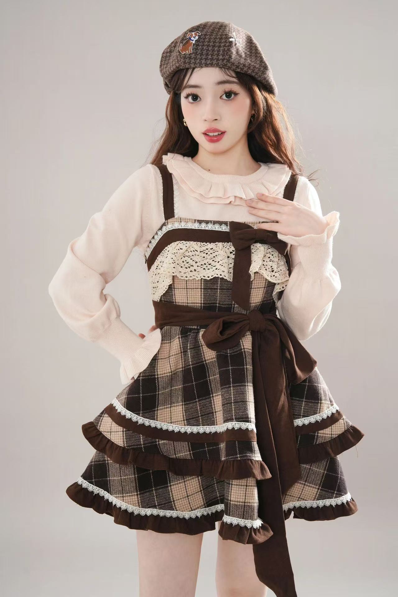 Design Concept:

This Sweet Lolita brown and apricot plaid JSK dress highlights a charming and cute bow design, blending soft colors with a classic Lolita aesthetic for a sweet and elegant look. Product Details: The set is composed of a matching top and skirt, creating a coordinated outfit that is both playful and refined.