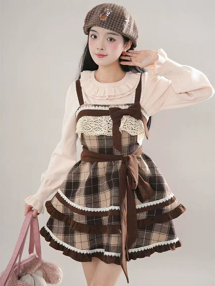 Design Concept:

This Sweet Lolita brown and apricot plaid JSK dress highlights a charming and cute bow design, blending soft colors with a classic Lolita aesthetic for a sweet and elegant look. Product Details: TDesign Concept:

This Sweet Lolita brown and apricot plaid JSK dress highlights a charming and cute bow design, blending soft colors with a classic Lolita aesthetic for a sweet and eleganthe set is composed of a matching top and skirt, creating a coordinated outfit that is both playful and refined.