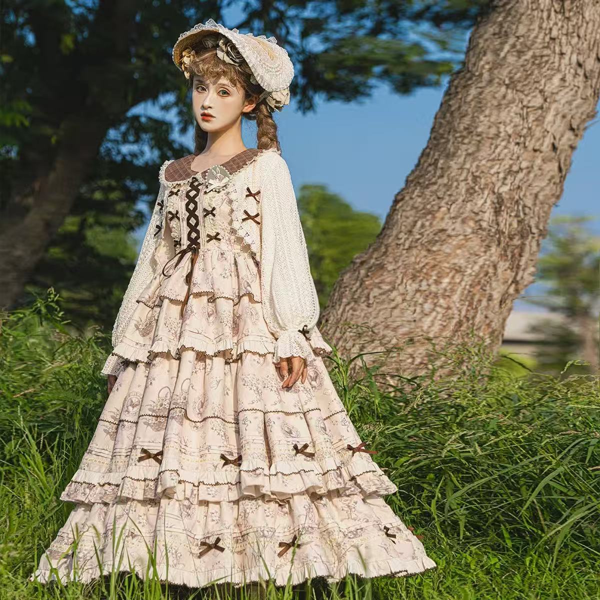 Design Concept:

This Sweet Lolita brown elegant daily dress set combines a refined silhouette with delicate lace and bow details, presenting a graceful and charming style suitable for everyday Lolita fashion. Product Details: The set includes one coat and one dress, offering a coordinated outfit that balances sweetness and elegance.