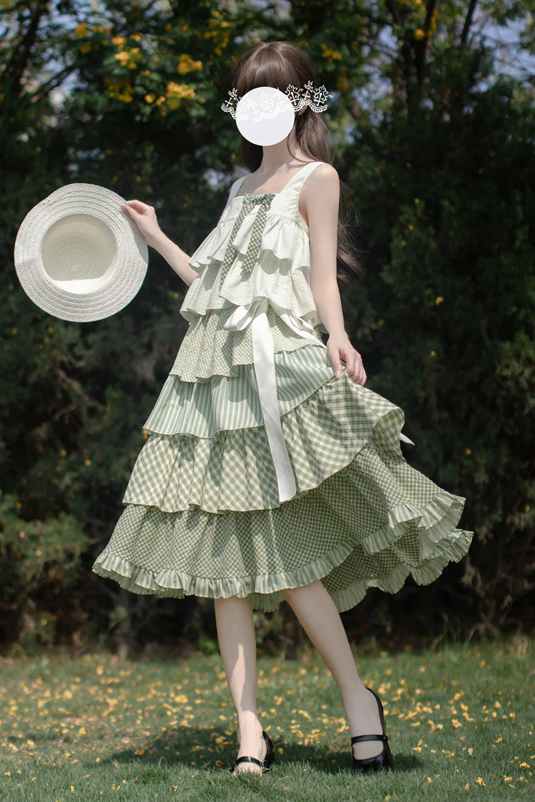 Design Concept:

This Sweet Lolita green layered printed ruffle JSK dress captures a playful holiday charm with its soft tones and delicate details. The multi-layered ruffles add volume and elegance, while the printed design enhances its sweet and lively style. The product includes one dress with a matching belt, creating a coordinated and flattering Lolita look.