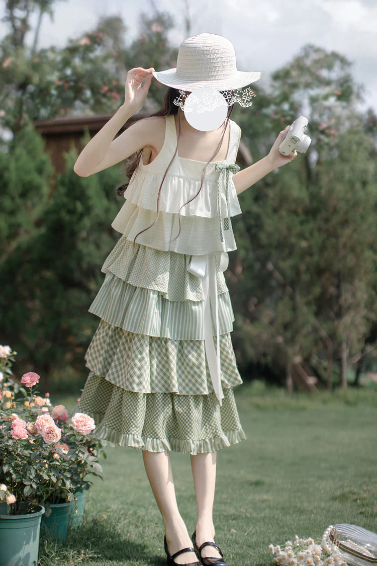 Design Concept:

This Sweet Lolita green layered printed ruffle JSK dress captures a playful holiday charm with its soft tones and delicate details. The multi-layered ruffles add volume and elegance, while the printed design enhances its sweet and lively style. The product includes one dress with a matching belt, creating a coordinated and flattering Lolita look.