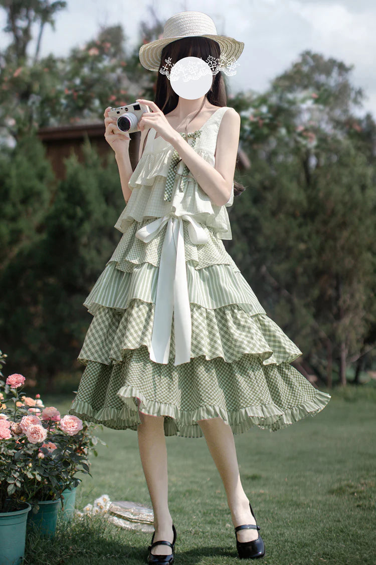 Design Concept:

This Sweet Lolita green layered printed ruffle JSK dress captures a playful holiday charm with its soft tones and delicate details. The multi-layered ruffles add volume and elegance, while the printed design enhances its sweet and lively style. The product includes one dress with a matching belt, creating a coordinated and flattering Lolita look.