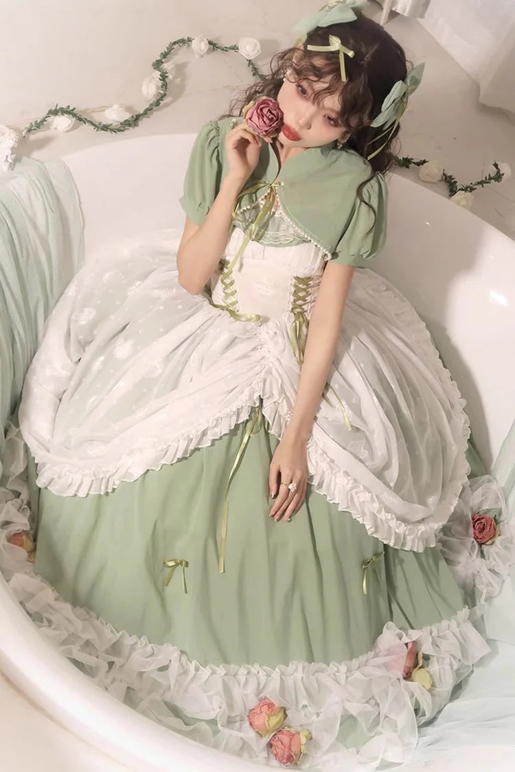 Design Concept:
Bring romantic charm to your wardrobe with this Sweet Lolita green JSK dress in a long version. Designed with layered ruffles, floral lace, and a lace-up bodice, it creates a graceful silhouette that flatters plus-size figures while maintaining a sweet aesthetic. The flowing length and delicate details evoke fairytale elegance, making it perfect for tea parties, outdoor photoshoots, or special gatherings. Comfortable yet enchanting, this JSK dress offers a versatile choice for creating dream