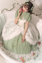 Design Concept:
Bring romantic charm to your wardrobe with this Sweet Lolita green JSK dress in a long version. Designed with layered ruffles, floral lace, and a lace-up bodice, it creates a graceful silhouette that flatters plus-size figures while maintaining a sweet aesthetic. The flowing length and delicate details evoke fairytale elegance, making it perfect for tea parties, outdoor photoshoots, or special gatherings. Comfortable yet enchanting, this JSK dress offers a versatile choice for creating dream