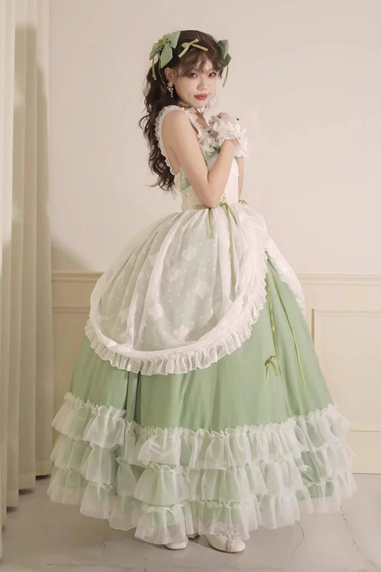 Design Concept:
Bring romantic charm to your wardrobe with this Sweet Lolita green JSK dress in a long version. Designed with layered ruffles, floral lace, and a lace-up bodice, it creates a graceful silhouette that flatters plus-size figures while maintaining a sweet aesthetic. The flowing length and delicate details evoke fairytale elegance, making it perfect for tea parties, outdoor photoshoots, or special gatherings. Comfortable yet enchanting, this JSK dress offers a versatile choice for creating dream