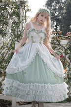Design Concept:
Bring romantic charm to your wardrobe with this Sweet Lolita green JSK dress in a long version. Designed with layered ruffles, floral lace, and a lace-up bodice, it creates a graceful silhouette that flatters plus-size figures while maintaining a sweet aesthetic. The flowing length and delicate details evoke fairytale elegance, making it perfect for tea parties, outdoor photoshoots, or special gatherings. Comfortable yet enchanting, this JSK dress offers a versatile choice for creating dream