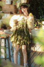 Design Concept:
Bring a touch of nature-inspired charm to your Lolita wardrobe with this Sweet Lolita green JSK dress set. Featuring delicate leaf embellishments, asymmetrical ruffles, and a flowing silhouette, it combines whimsical elegance with playful sweetness. The soft fabric ensures comfort while maintaining a graceful fit, making it perfect for tea parties, photoshoots, or themed gatherings. This versatile set adds a fresh, enchanting feel to any Lolita coordinate, capturing the essence of dreamy, ga