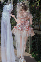Design Concept:&nbsp;

This Sweet Lolita pink sleeveless JSK dress features multi-layered ruffles, delicate lace, and charming bow details, creating a dreamy and elegant princess style. The soft pink tone adds sweetness, making it perfect for a refined Lolita look. The product includes a dress, a front chest accessory, and a back bow with a trailing tail, offering a coordinated and enchanting outfit.