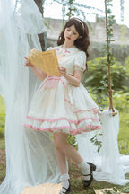 Design Concept:
Delight in playful elegance with this Sweet Lolita dress in soft white and pink tones. Featuring short sleeves, multi-layered ruffles, and charming bow accents, it exudes a sweet and refined aesthetic. The flowing silhouette enhances a graceful look, making it perfect for tea parties, casual outings, or themed gatherings. Comfortable and visually enchanting, this dress brings a youthful, princess-like charm to any Lolita wardrobe.